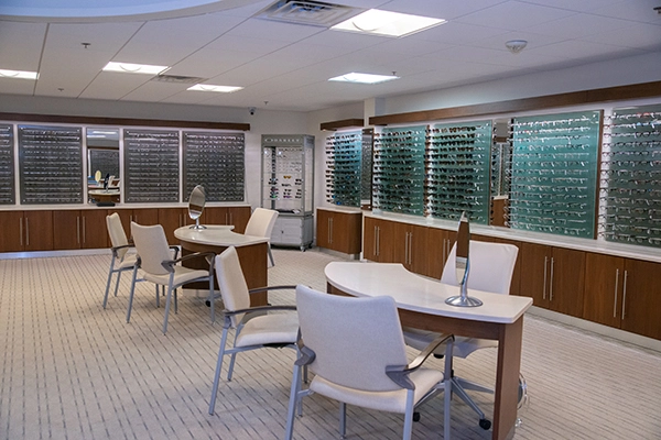 eyeglasses showroom with desks and chairs