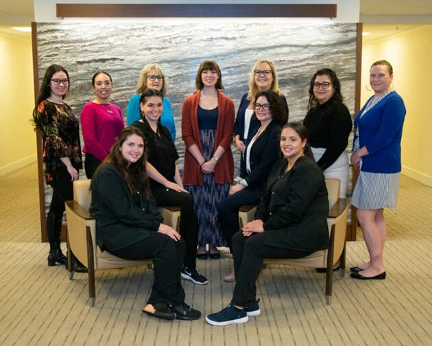 Staff members of Simon Eye Pike Creek.