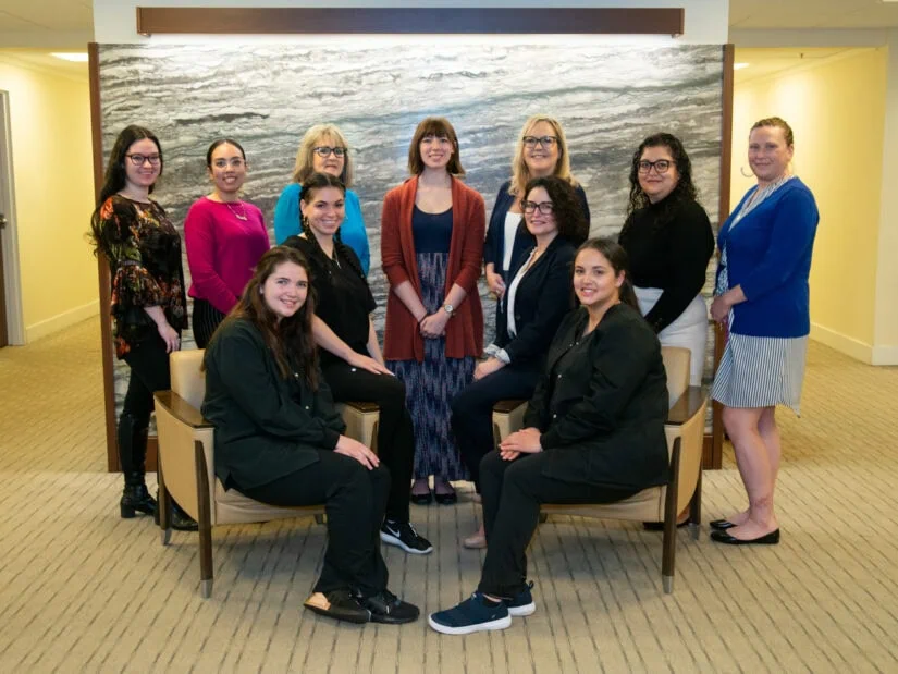 Staff members of Simon Eye Pike Creek.