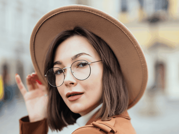 woman with short brown hair with eye glasses
