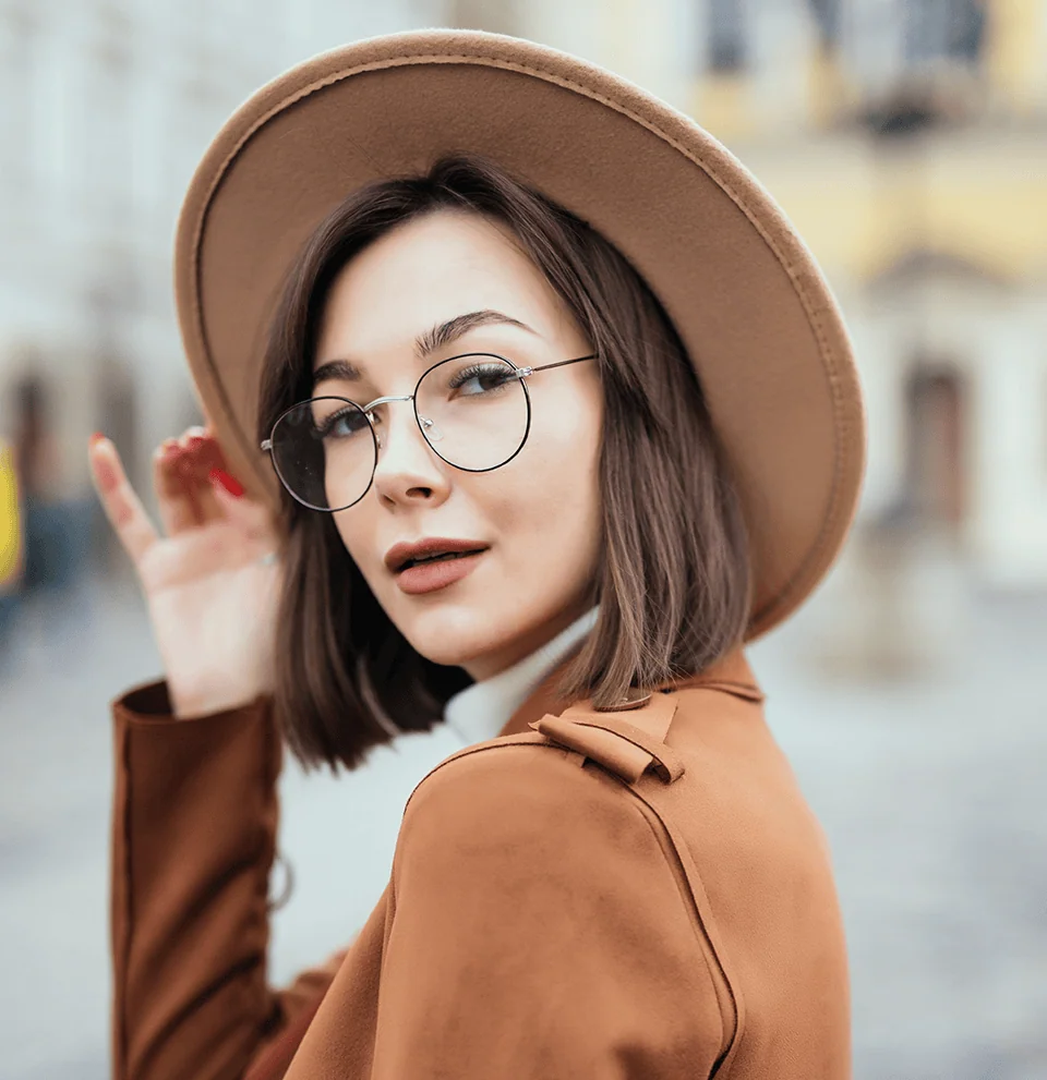 woman with short brown hair with eye glasses